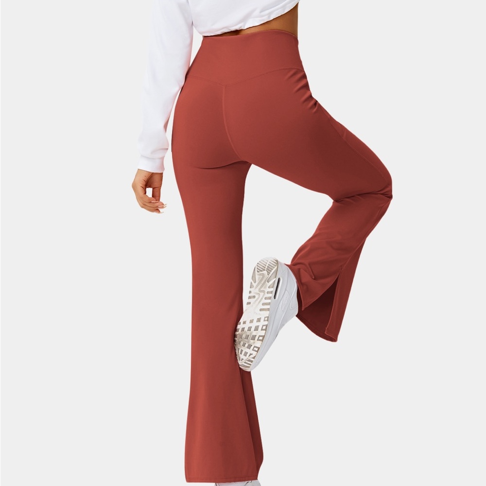 NWT HALARA crossover flare leggings .  High waisted, split opening, burnt orange